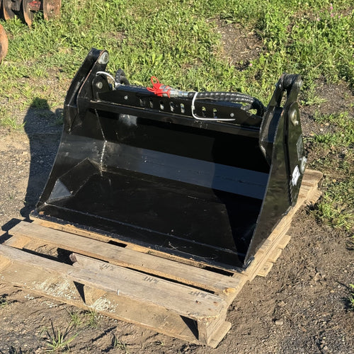 4-in-1 bucket three quarter view showing bucket interior and cutting edge