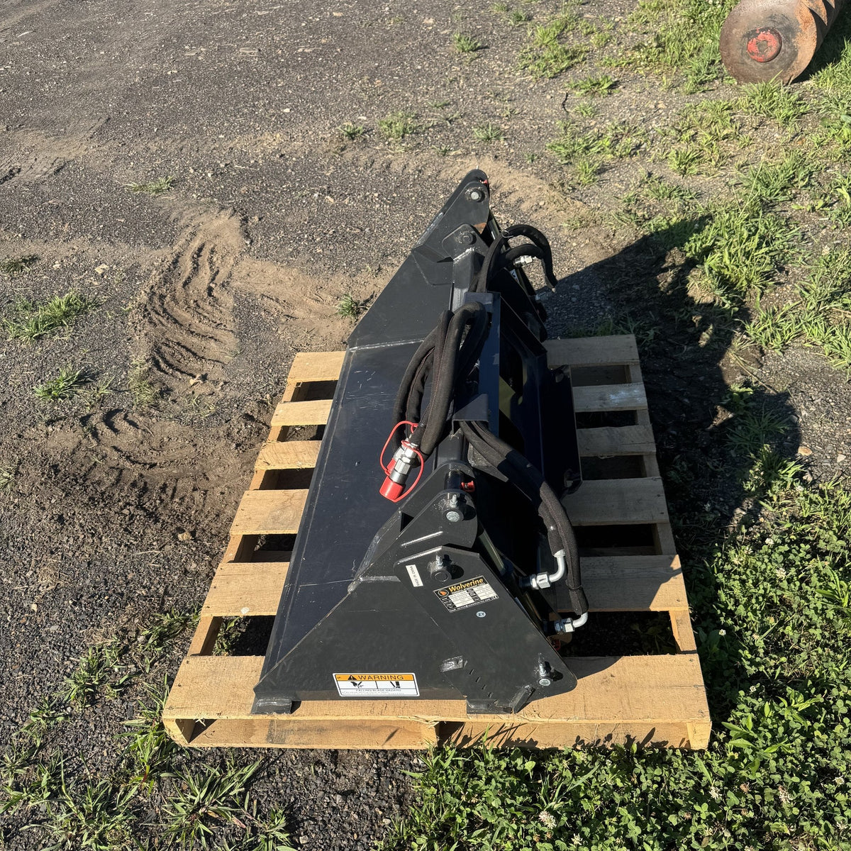 4-in-1 bucket three quarter view with manufacturer data plate