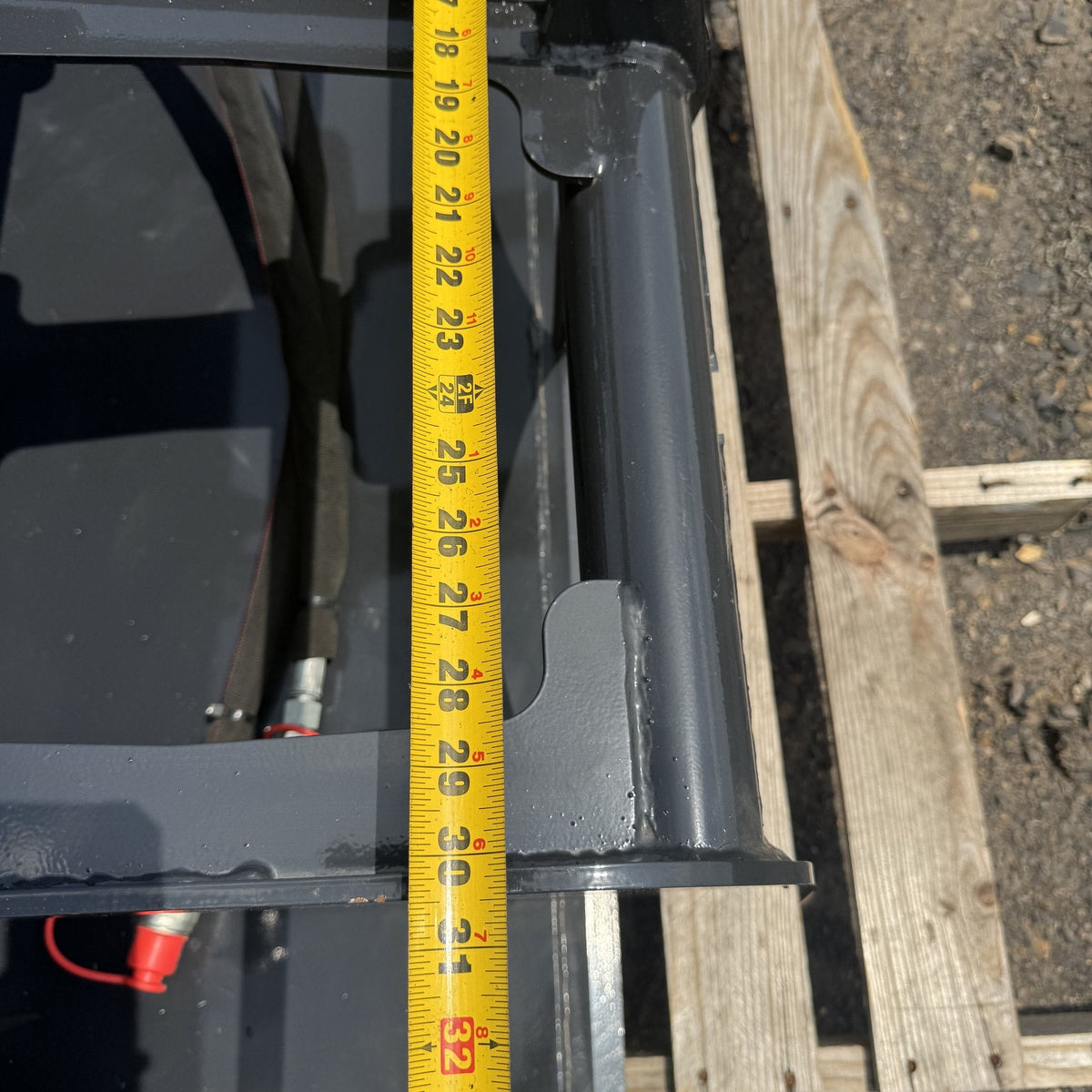 Tape measure showing grapple bucket depth