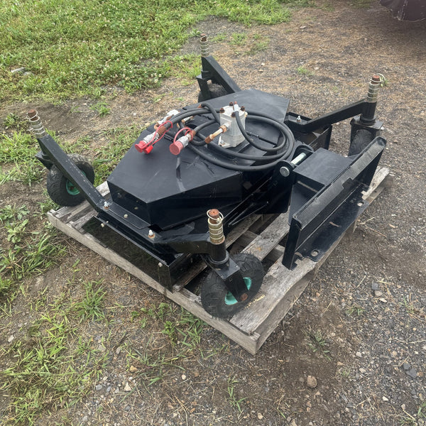 Mini skid steer finish mower deck on a pallet, three quarter view