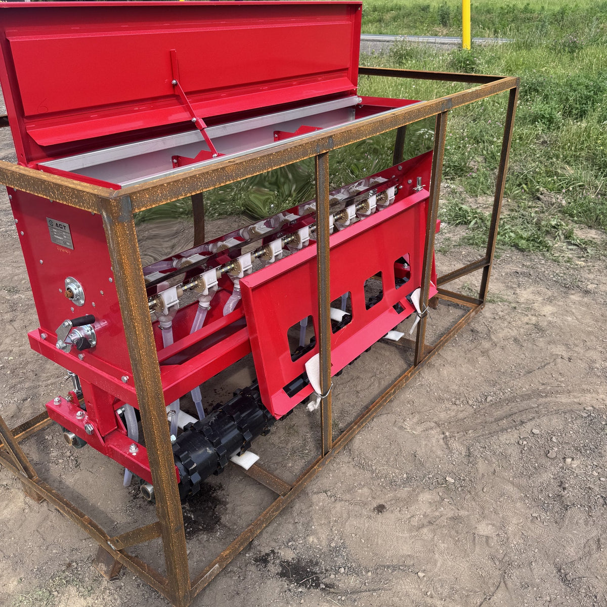 Seed hopper open on the no till drill