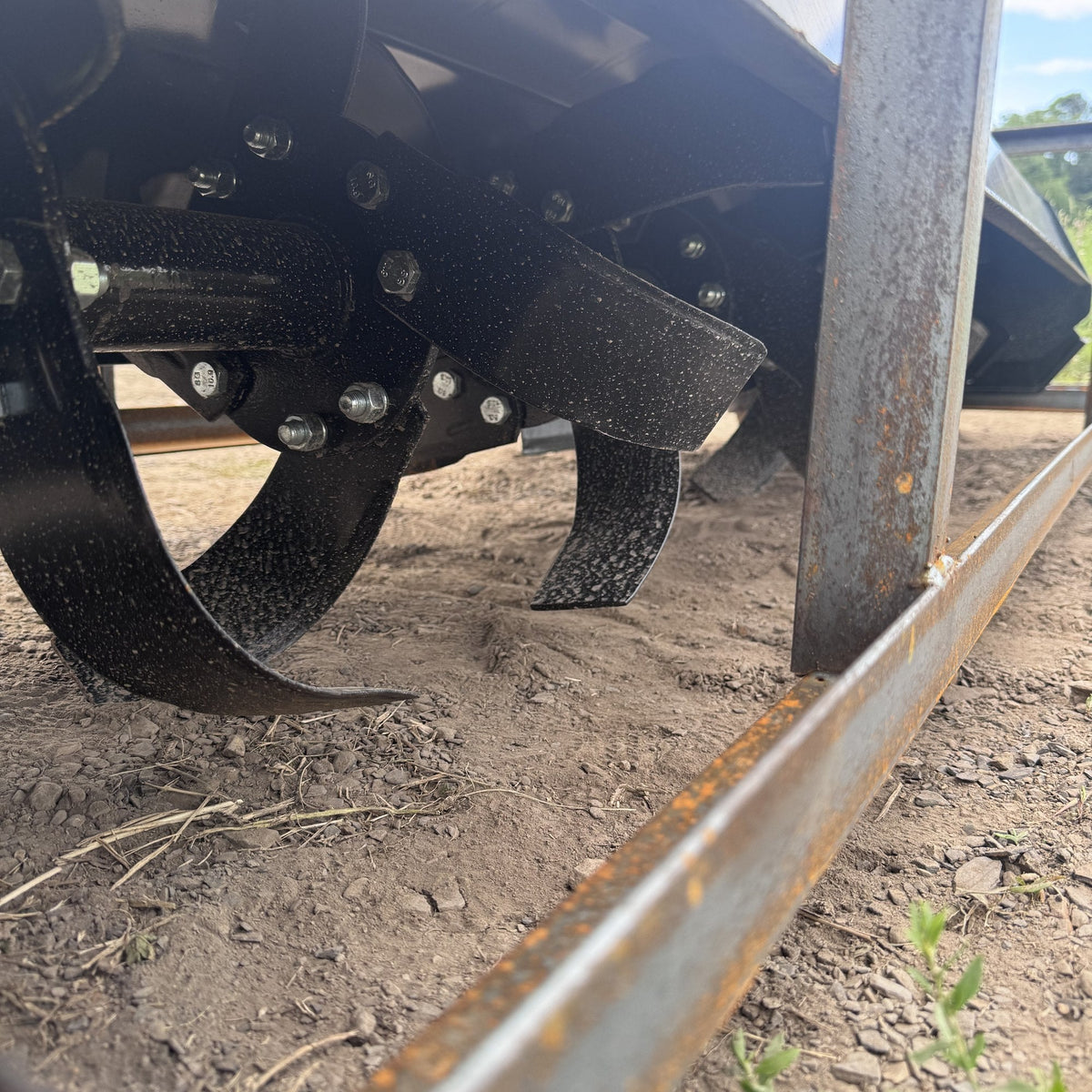 Replaceable tines on the rototiller rotor